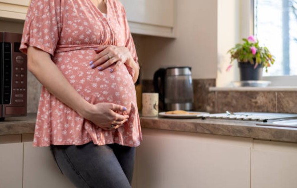 What is enhanced maternity pay
